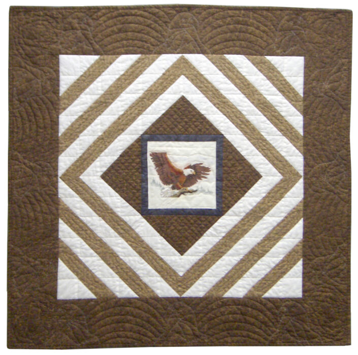 Image of contemporary textile artwork Eagle Wings by Wisconsin artist Jean M. Judd.